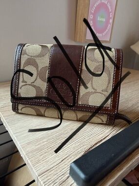 SOLD
Coach Hampton Signature Brown Jacquard Stripe Mahogany Clutch Wallet